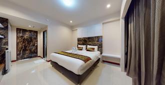 Laemthong Hotel - Hat Yai - Bedroom