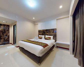 Laemthong Hotel - Hat Yai - Schlafzimmer