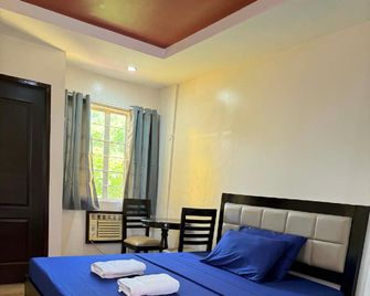Valuenest Stay - Naga - Camera da letto