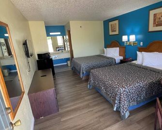 Executive Inn - Mountain Home - Schlafzimmer