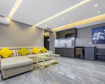 Magnotel Dandong Tianci Future City Jinshan Avenue - Dandong - Wohnzimmer