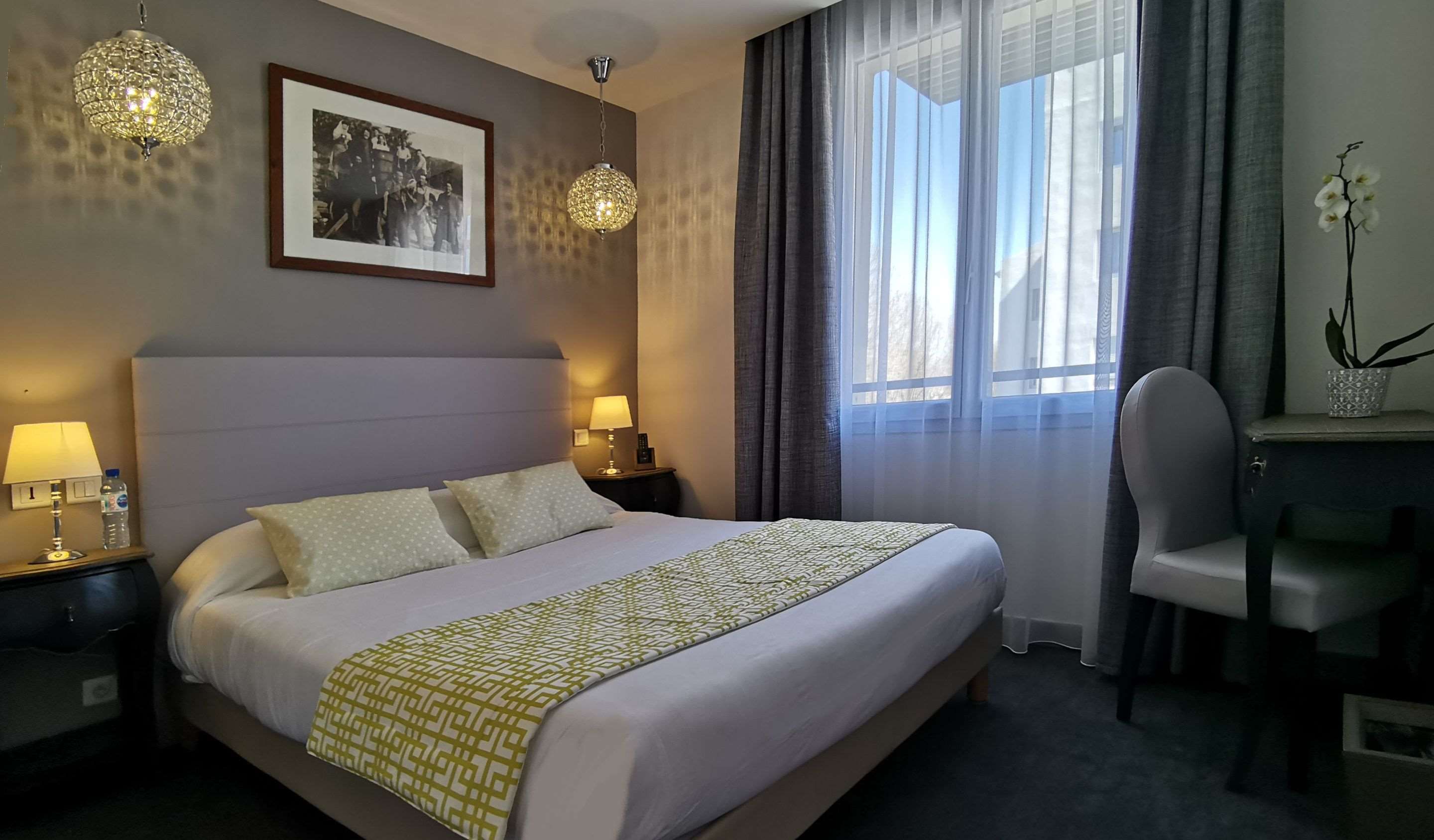 Brit Hotel Acacias - ארל - חדר שינה