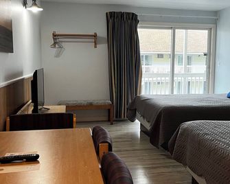 Mainsail Motel & Cottages - Hampton - Schlafzimmer