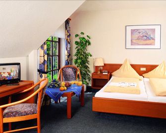 Hotel Up'n Diek - Varel - Slaapkamer