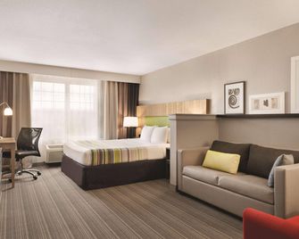 Country Inn & Suites by Radisson, Green Bay E, WI - גרין ביי - חדר שינה
