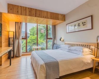 Floral Hotel Hangzhou Pupu - Hangzhou - Habitación