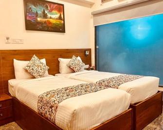 Krishna's Inn - Srīperumbūdūr - Bedroom