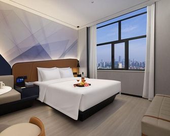 Huanzhi Hotel Hulunbuir Hailar Railway Station Branch - Hulunbuir - Bedroom