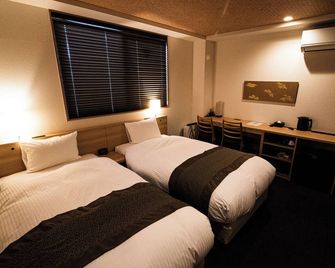 Hotel akari - Койото - Спальня
