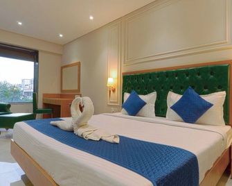 Magnus Nexstar Suites - Pune - Bedroom