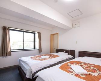 Tabist Hotel Yamashiro Onsen - Yamanashi - Спальня