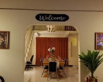Welcome to Canewood Manor. brHost: Candi and Glen. br - St. Michael - Dining room