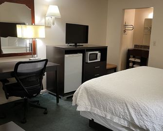 Slumber Inn Harrisonville - Harrisonville - Bedroom