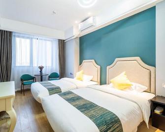 Sweeting Apartment (Qingdao Hangzhou Road) - تشينغداو - غرفة نوم