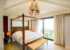 Navy Hill Resort - Garapan - Schlafzimmer