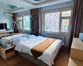Fanghuali Hotel - Harbin - Bedroom