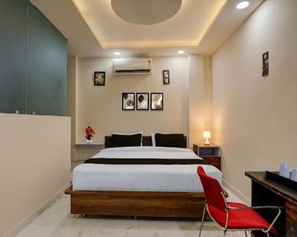 Deluxe Hotel Avon - Kanpur - Schlafzimmer