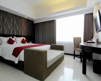 The Sun Hotel Madiun - Madiun - Schlafzimmer