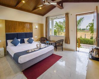 Corbett Jungle Breeze Resort - Rāmnagar - Bedroom