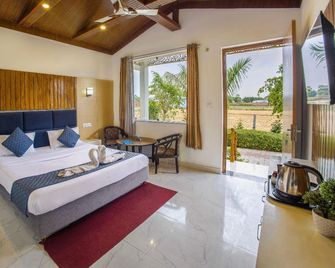 Corbett Jungle Breeze Resort - Rāmnagar - Chambre