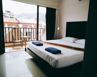 Boomerang Inn - Patong - Schlafzimmer