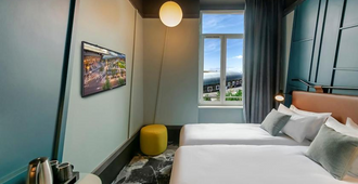 Hotel Nid de Cigognes Strasbourg Centre Gare - Strasbourg - Bedroom