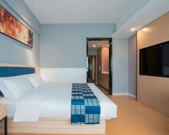 Aifeel Hotel (Dali Taiye International Plaza) - Dali - Habitación