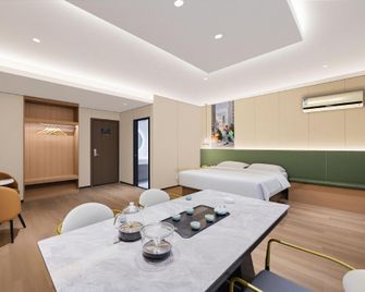 Nanyuan Inn (Ningbo Tianyi Square Chenghuangmiao Metro Station) - Ningbo - Makuuhuone