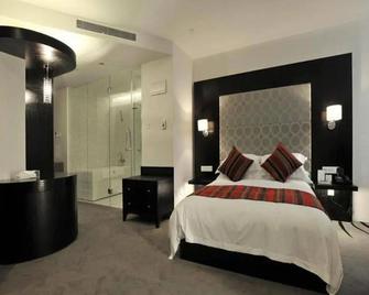 Tian Ping Hotel - Shanghai - Bedroom