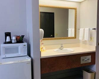 BridgePointe Inn & Suites by BPhotels, Lincoln I-80 & 27th St - לינקולן - חדר שינה