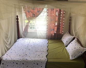 Home away from home for the coolest moments of stay. - Mbale - Bedroom