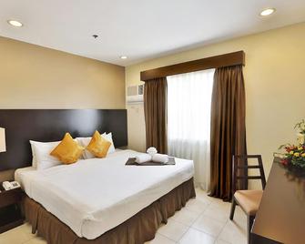 Alpa City Suites Hotel - Mandaue City - Slaapkamer