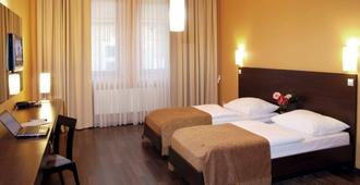 Hotel Zlaty Dukat - كوسيتش - غرفة نوم
