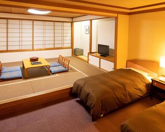 Oze Iwakura Resort Hotel - Katashina - Спальня