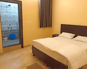 Hotel O Paradise Inn - Jabalpur - Slaapkamer