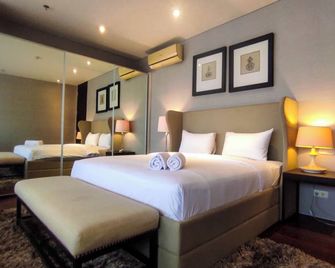 Apartment 3BR with River View in City Center at Sumatra36 Surabaya By Travelio - Surabaya - Bedroom