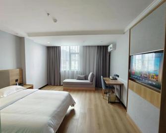 Greentree Inn Anhui Huainan Liulizhan Express Hotel - Huainan - Slaapkamer