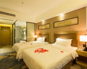 Sovereign Hotels & Resorts - Foshan - Schlafzimmer