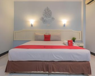 RedDoorz Syariah at Grand Taufiq Tarakan - Tarakan - Bedroom