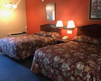 Red Carpet Inn - Hot Springs - Bedroom