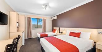 Econo Lodge Moree Spa Motor Inn - Moree - Bedroom