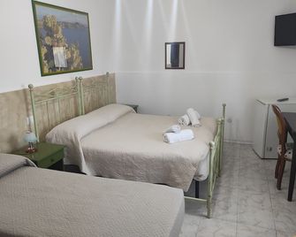 La Casetta B&B - מילאצו - חדר שינה