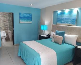 Hotel Cortez - אנסנדה - חדר שינה