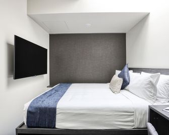 Microtel by Wyndham Wellington - Wellington - Bedroom