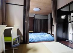Osaka Cozy Tatami House 2-storied - Suita - Bedroom