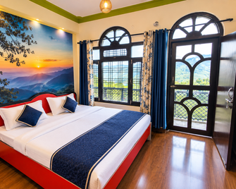 Goroomgo Mount Kailash Homestay Munsyari - Munsyari - Bedroom