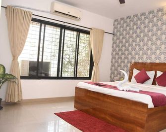 Tulsi Home Stay - Mumbai - Bedroom