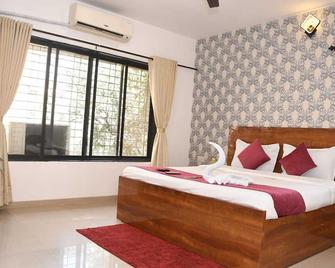 Tulsi Home Stay - מומבאי - חדר שינה