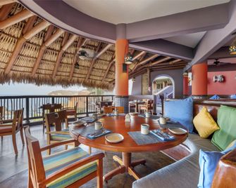 Hilton Grand Vacations Club Zihuatanejo Mexico - إكستابا زيواتانيجو - مطعم