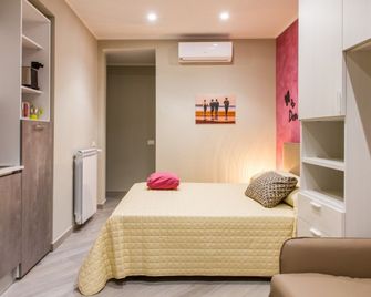 Suite Bordonaro Apartments - Cefalù - Slaapkamer